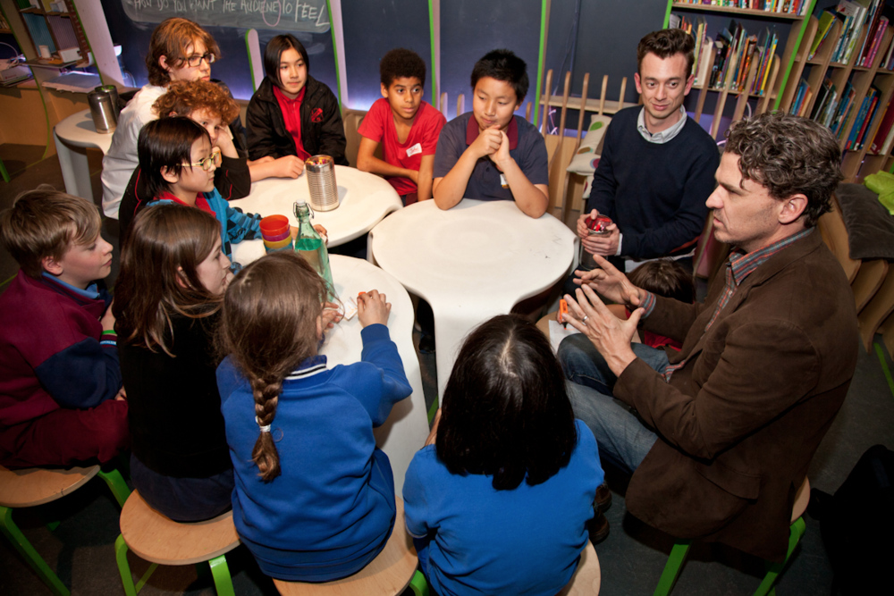 826 Valencia co-founder Dave Eggers with young people at The Martian Embassy